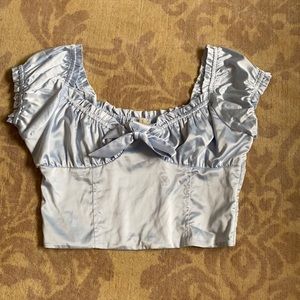 Blue satin cropped shirt. From PacSun